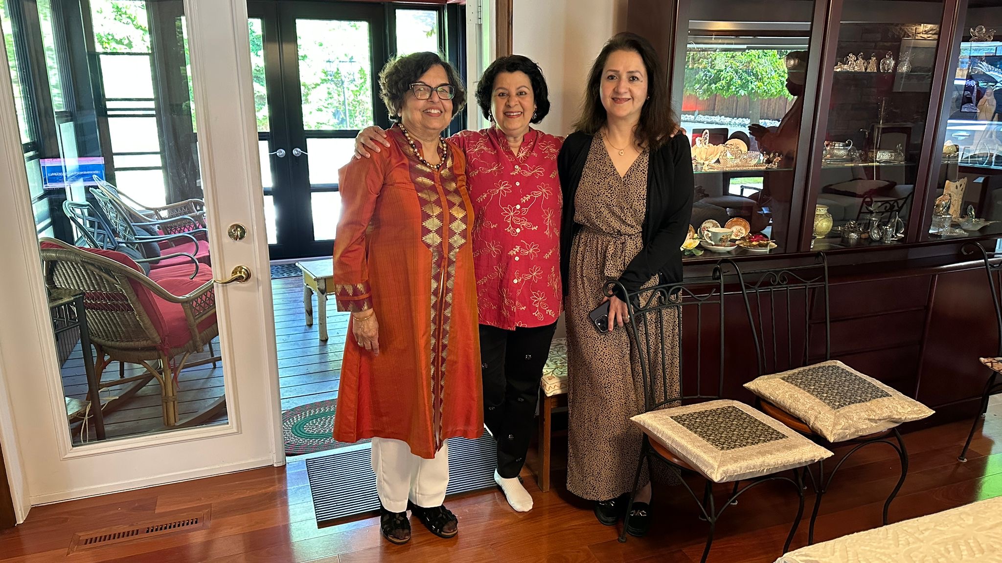 Three members together before the meeting