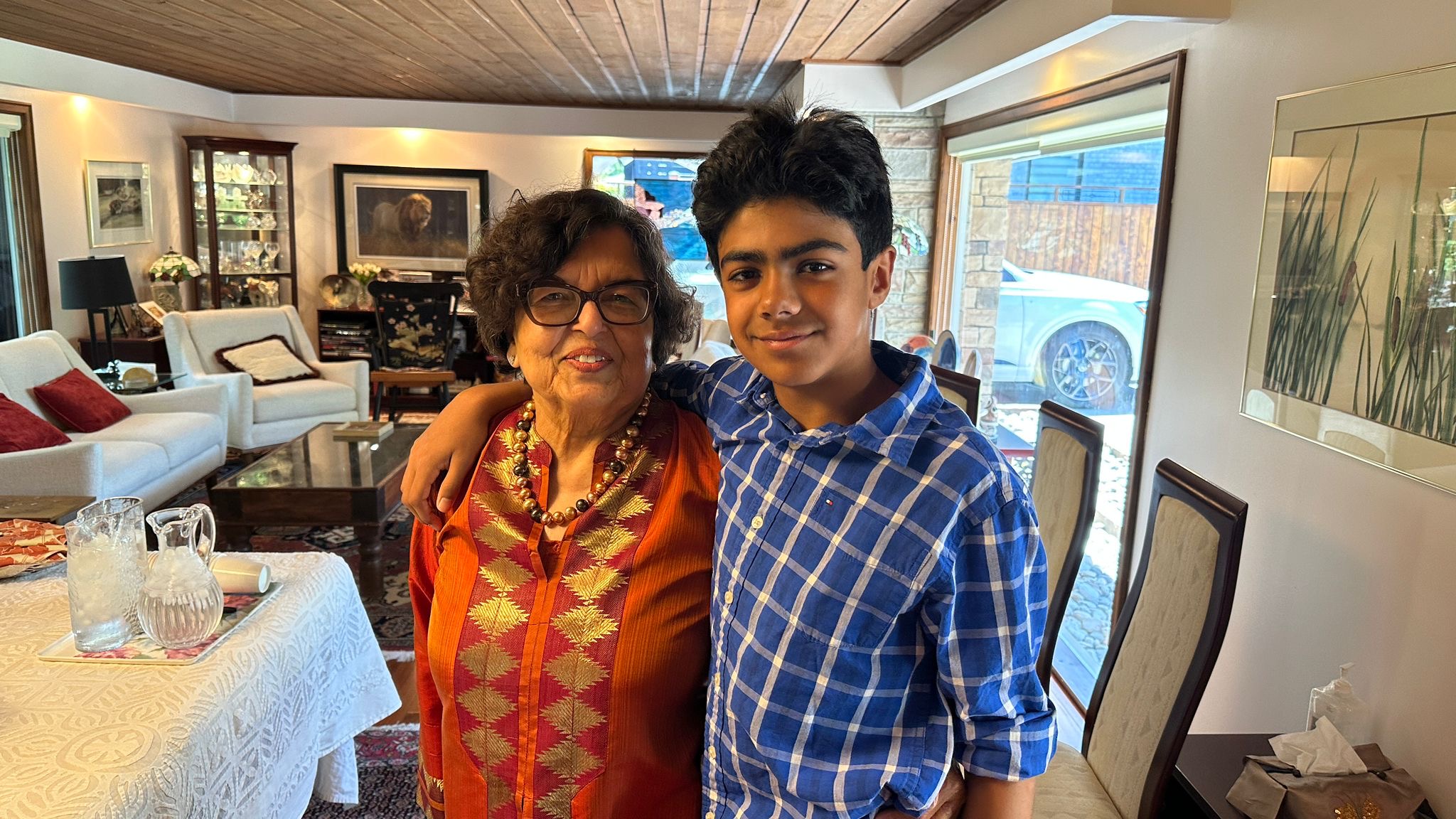A founding member with a young volunteer