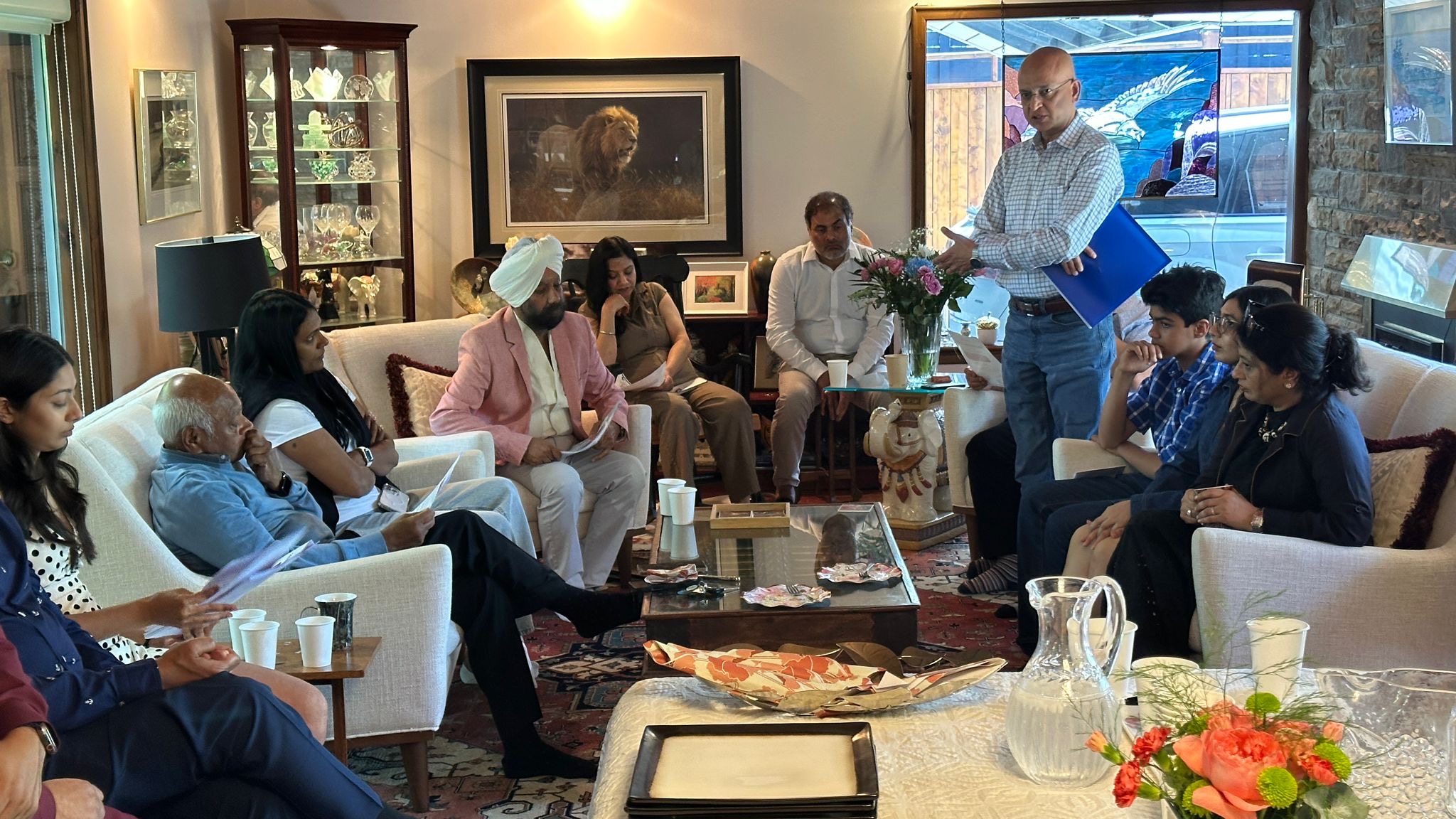 A member delivering a report to the meeting