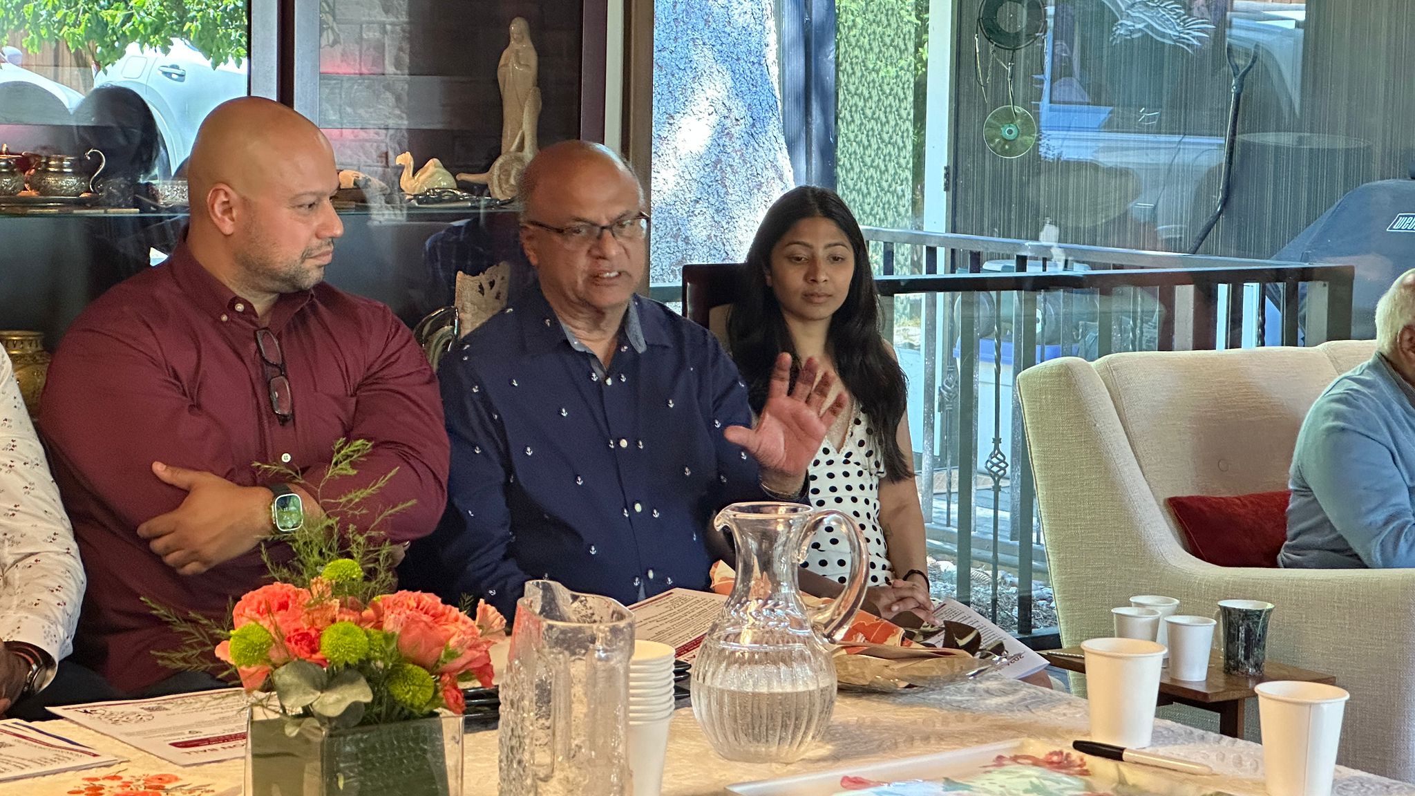 Members listening from the table
