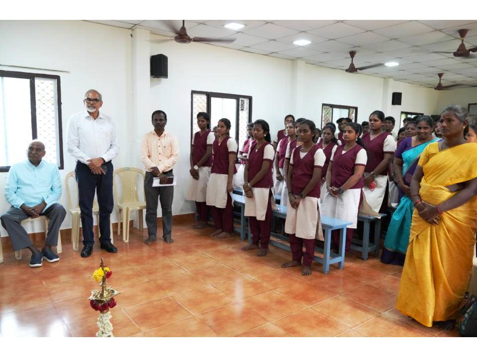 Guests seated for an opening ceremony in a training classroom