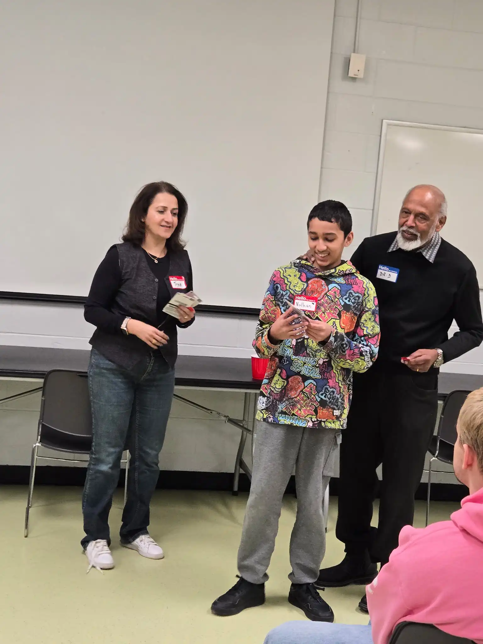 A participant receiving his certificate at the Mental Health Day event