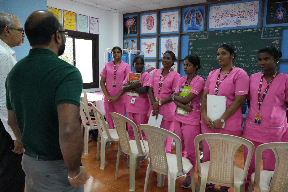 Nursing students meeting the visitors in the college nursing lab