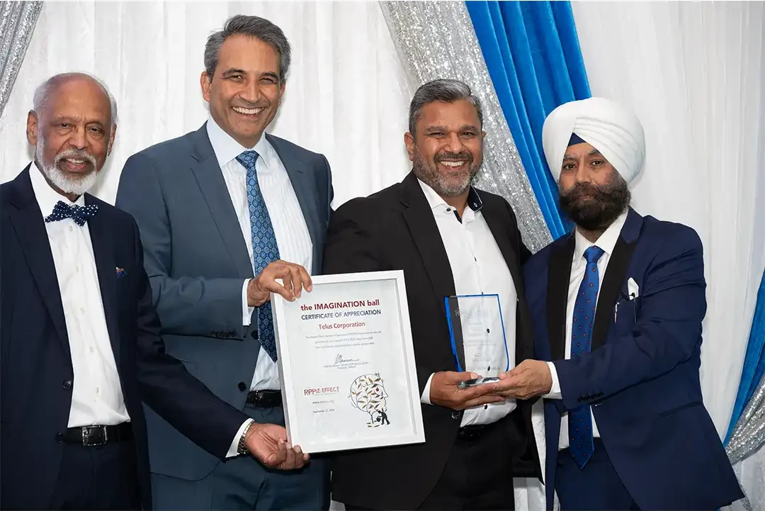 Dr Manish Maingi receiving his award